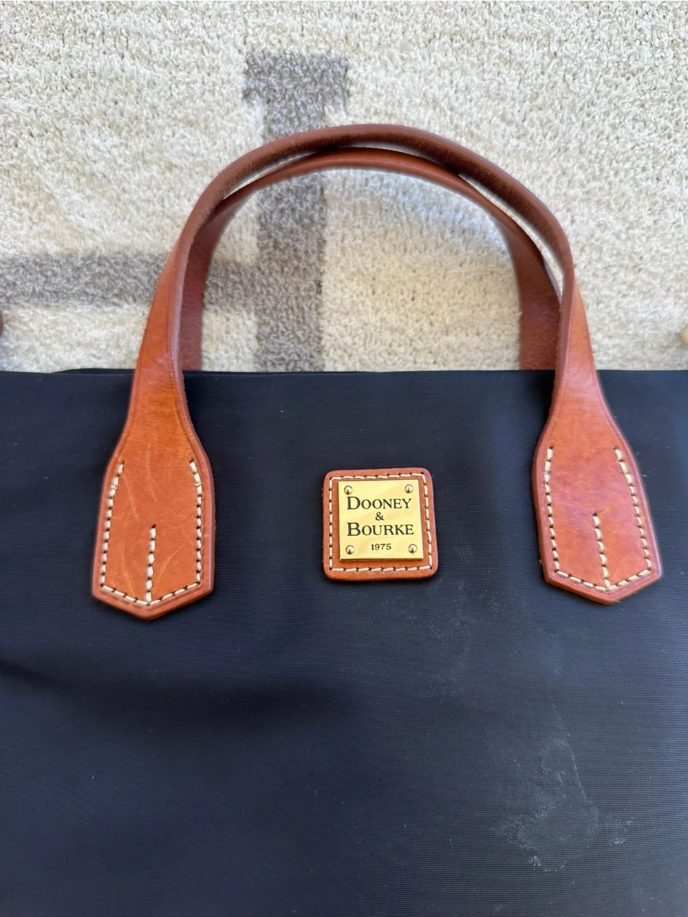 Nylon navy Dooney tote with crossover strap